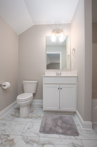 421 Alter Terrace Lebanon, TN 37087 - Photo 29 of 44 a bathroom with a toilet a sink and mirror