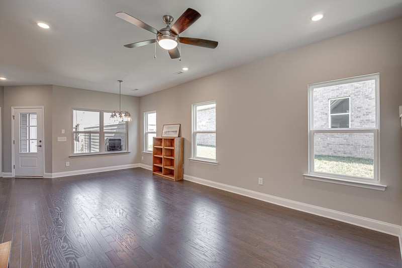 421 Alter Terrace Lebanon, TN 37087 - Photo 9 of 44 a view of an empty room with wooden floor and a window
