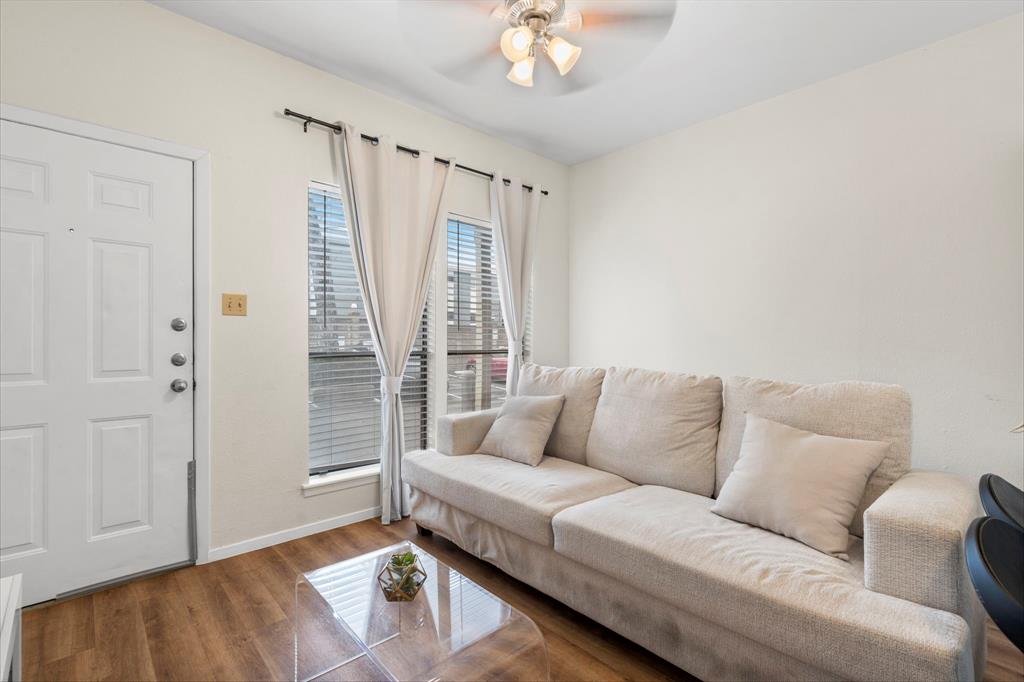 3000 Guadalupe Street, Unit 110 Austin, TX 78705 - Photo 2 of 27 a living room with furniture and a large window