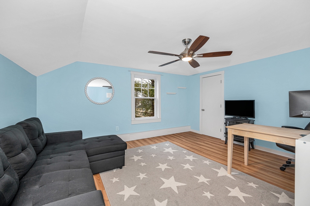 567 Andover Street, Unit A Lowell, MA 01852 - Photo 31 of 35 a living room with furniture