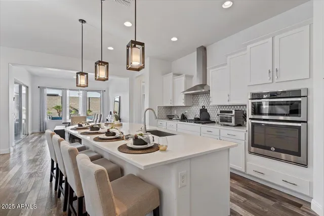 a view of a dining room with furniture and window