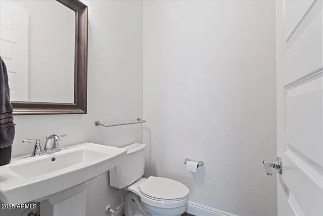 a view of a house with swimming pool and sitting area