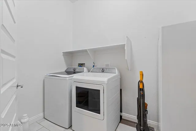 a view of a backyard with swimming pool