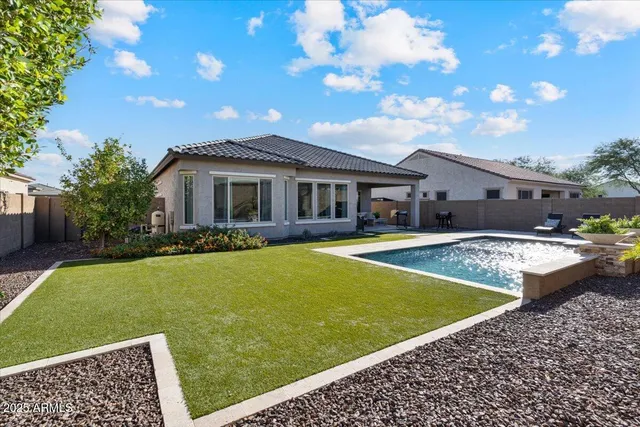 a bedroom with a bed and a closet