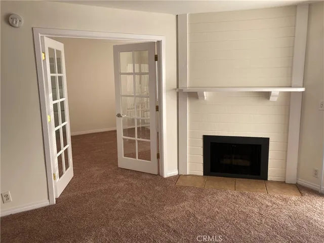 a view of a livingroom with a fireplace