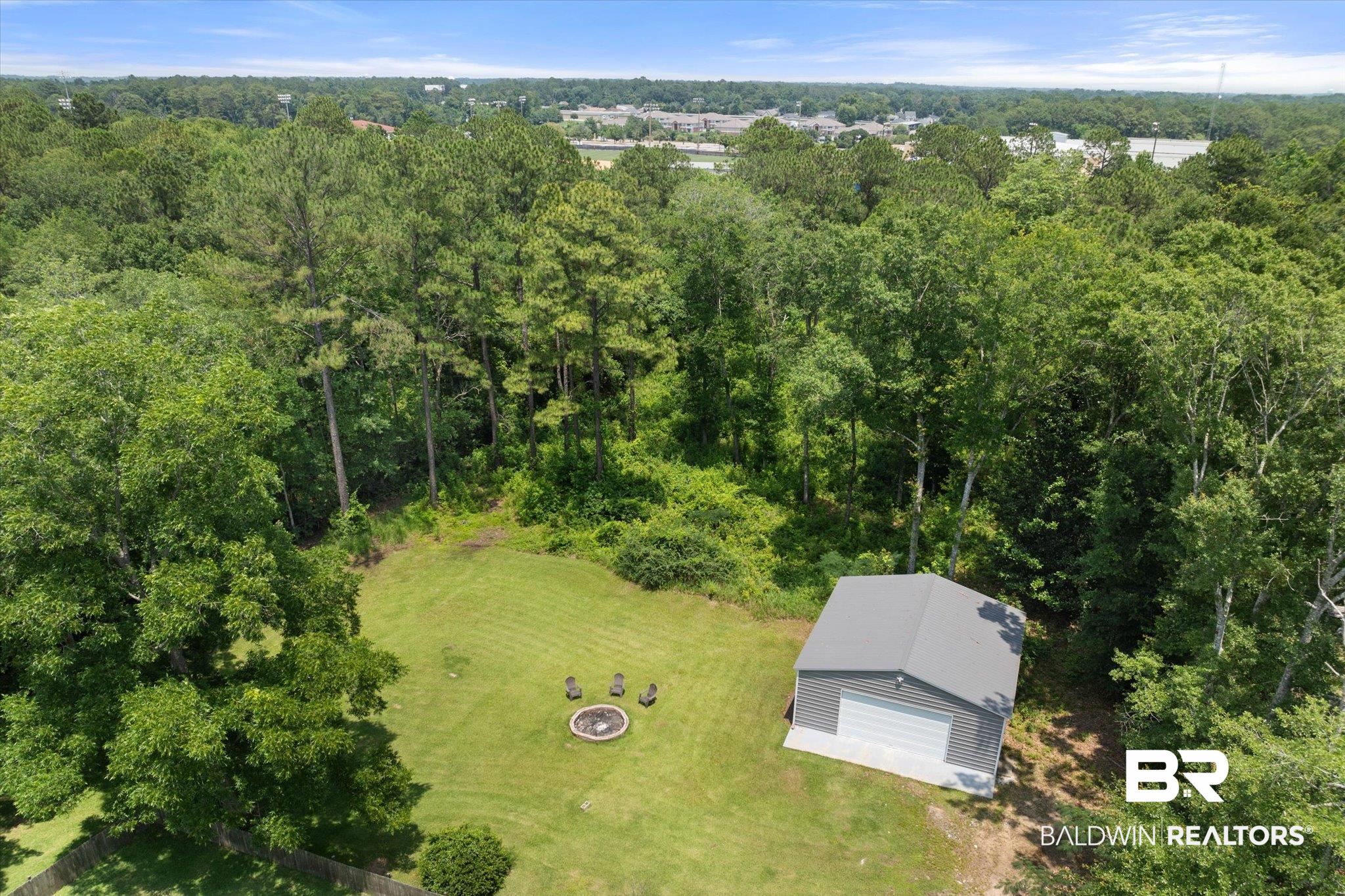 1025 Walter Smith Road Mobile, AL 36695 - Photo 45 of 46 Aerial view of a heavily wooded area