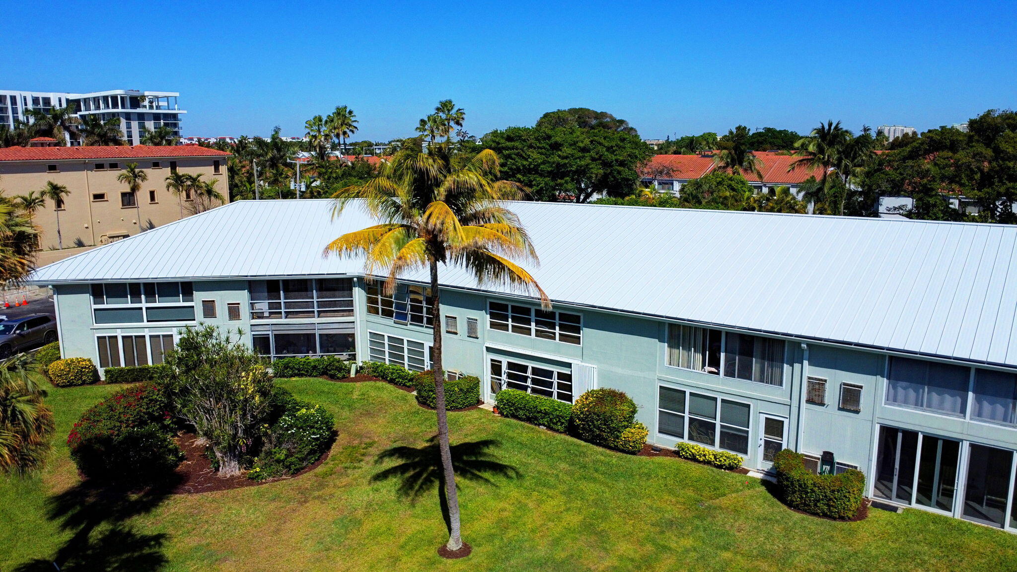 5550 North Ocean Boulevard, Unit 114 Ocean Ridge, FL 33435 - Photo 37 of 54 a aerial view of a house with swimming pool yard and outdoor seating