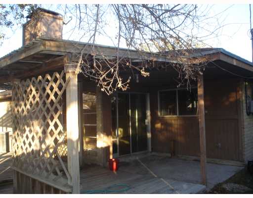 6937 Edgebrook Drive Corpus Christi, TX 78413 - Photo 8 of 9 a view of a house with a tree