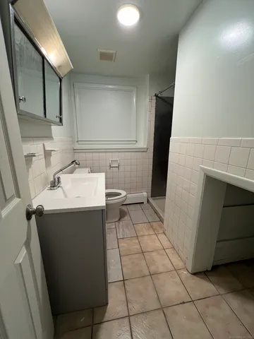a utility room with cabinets