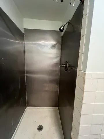 a bathroom with a bath tub