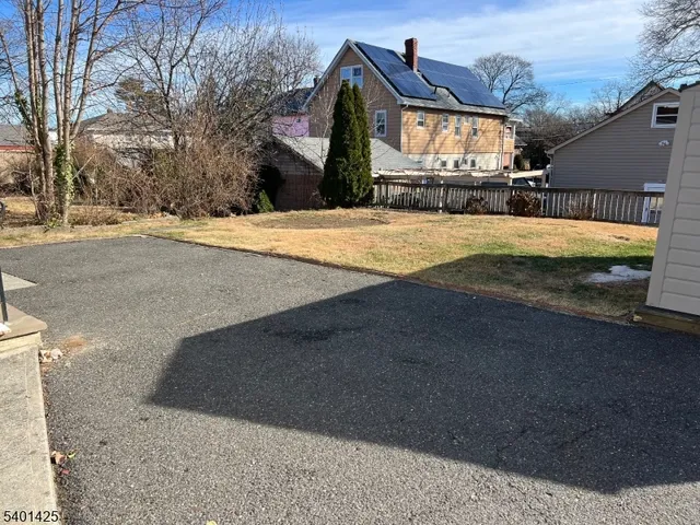 a view of swimming pool with a yard
