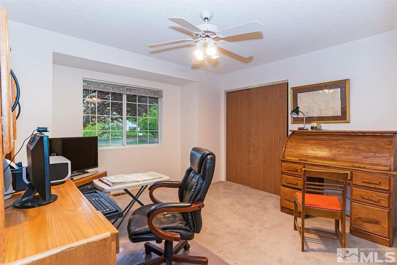 14585 Seminole Trail Reno, NV 89521 - Photo 11 of 15 a workspace with furniture and a window