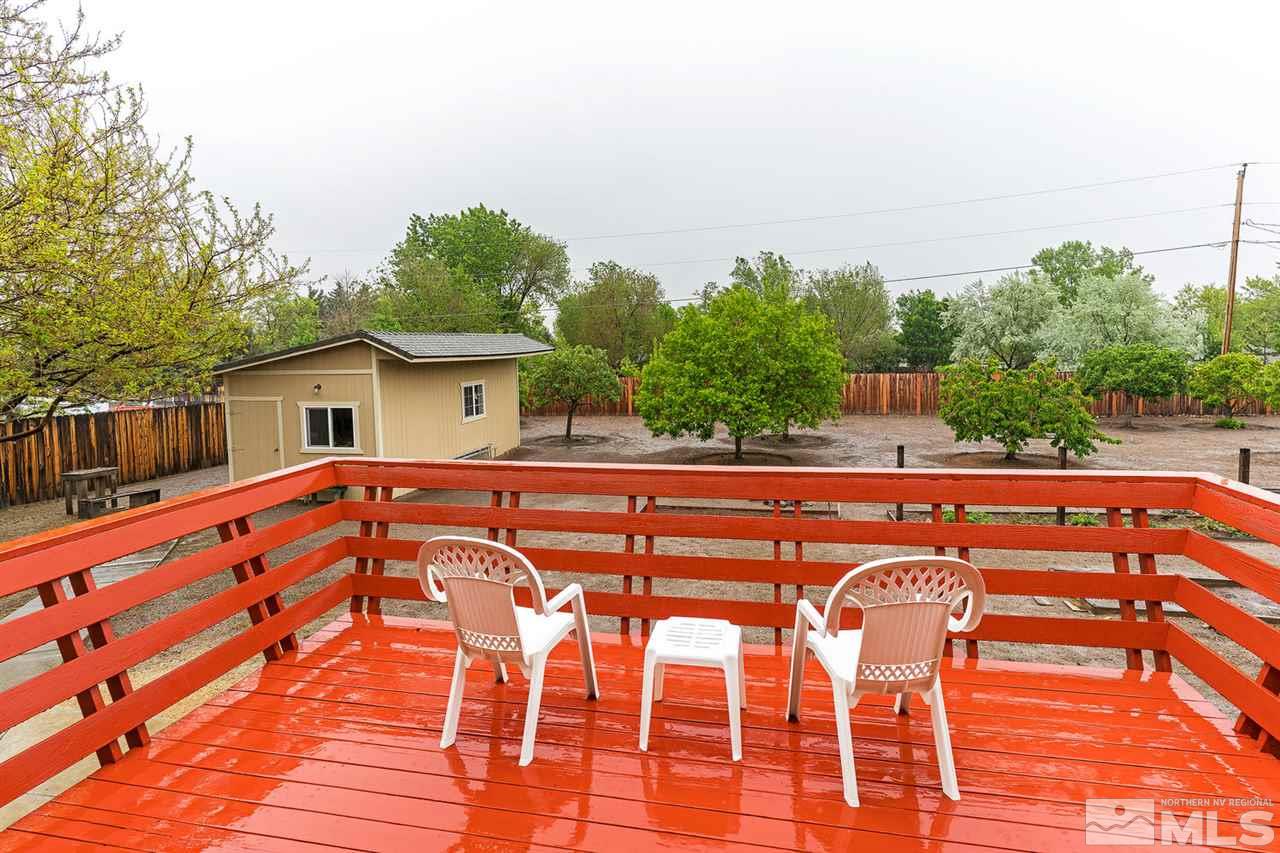 14585 Seminole Trail Reno, NV 89521 - Photo 13 of 15 a balcony with table and chairs