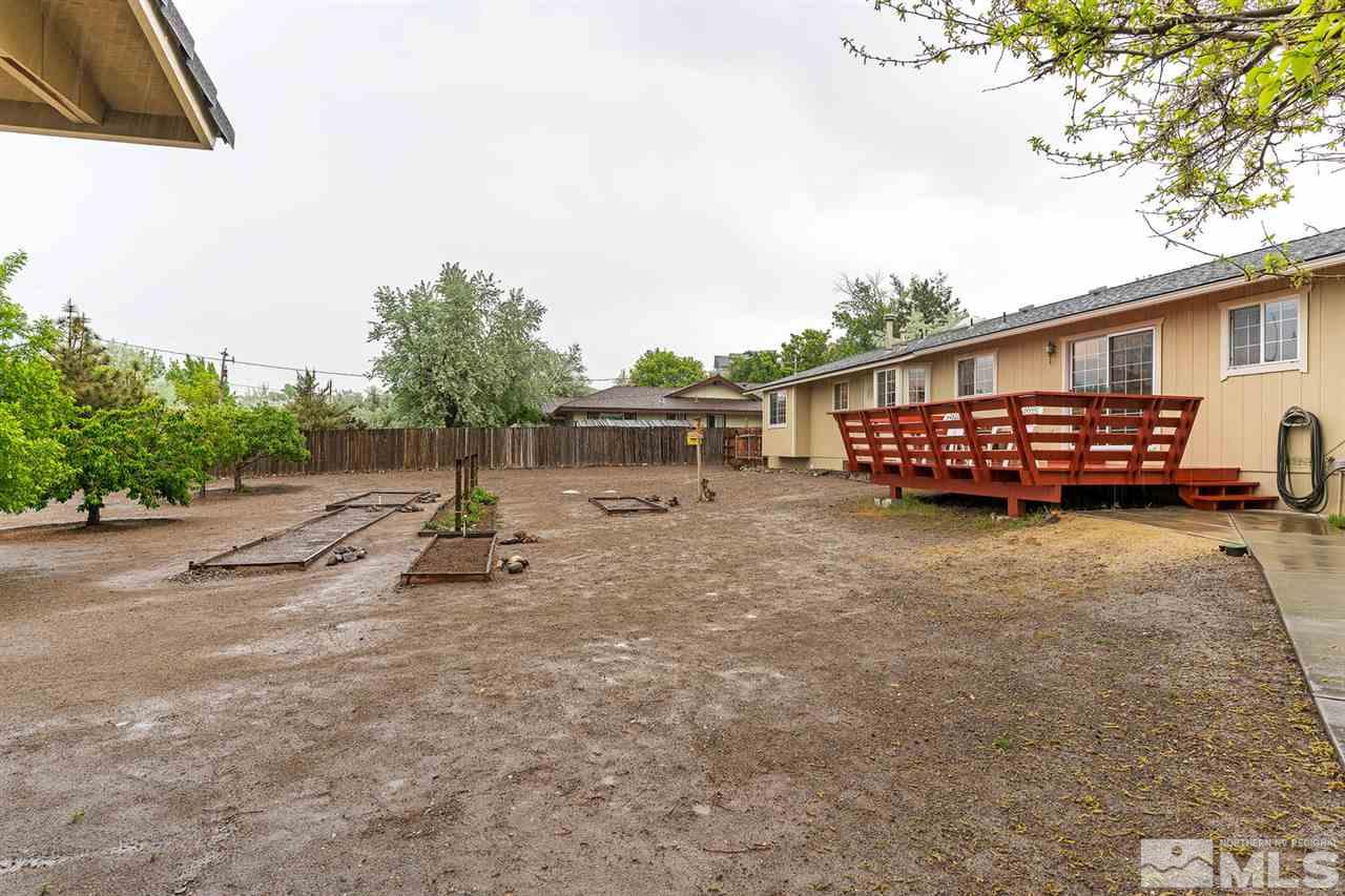 14585 Seminole Trail Reno, NV 89521 - Photo 15 of 15 a view of a backyard with sitting area