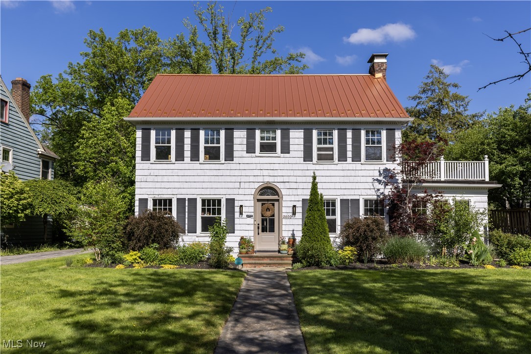 2671 Haddam Road Cleveland, OH 44120 - Photo 1 of 34 Colonial home with a chimney, a front yard, and metal roof