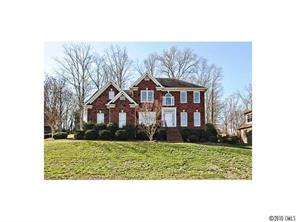 340 Gringley Hill Road Fort Mill, SC 29708 - Photo 1 of 15 a front view of a house with a yard