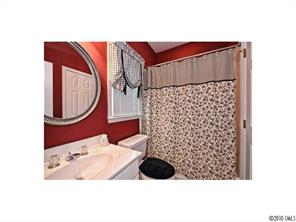 340 Gringley Hill Road Fort Mill, SC 29708 - Photo 9 of 15 a bathroom with a sink toilet and a mirror