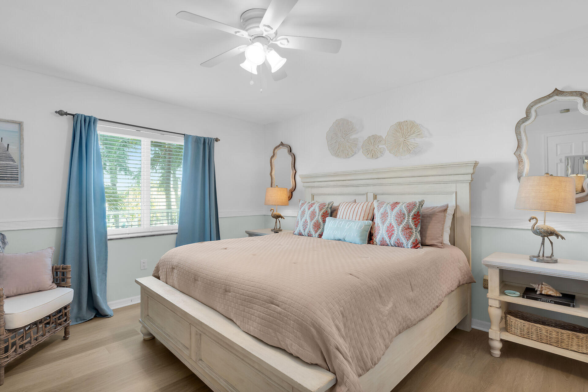 351 10th Street Key Colony Beach, FL 33051 - Photo 12 of 47 a bedroom with a bed and a chandelier