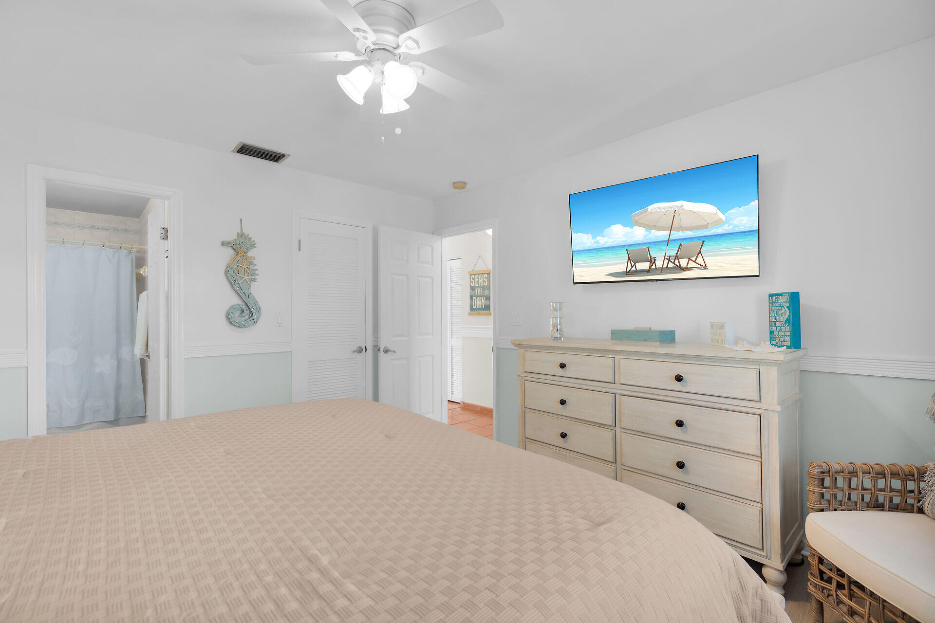 351 10th Street Key Colony Beach, FL 33051 - Photo 14 of 47 a bedroom with a bed and a flat screen tv