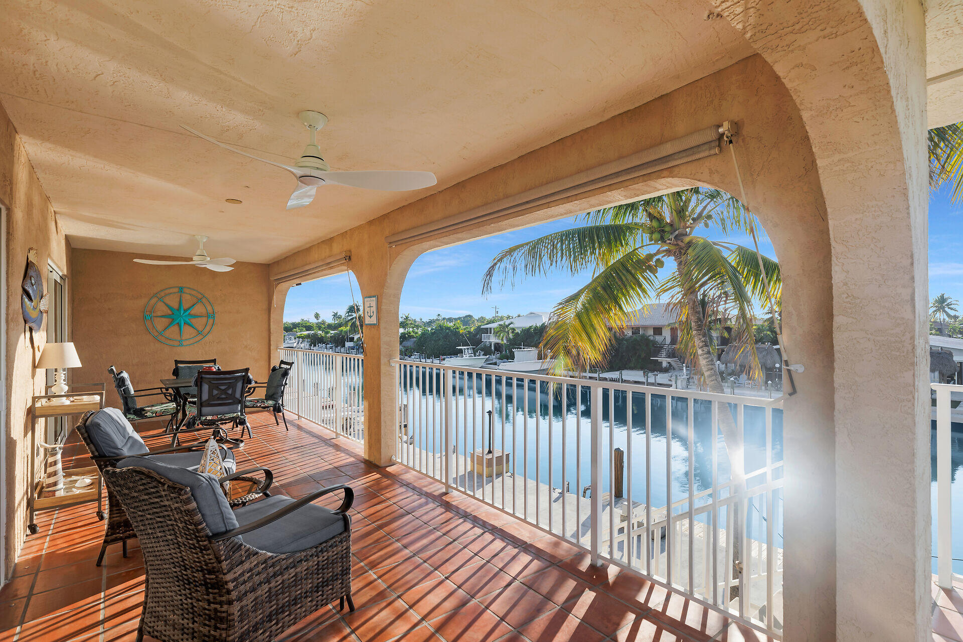 351 10th Street Key Colony Beach, FL 33051 - Photo 22 of 47 a outdoor space with wooden floor