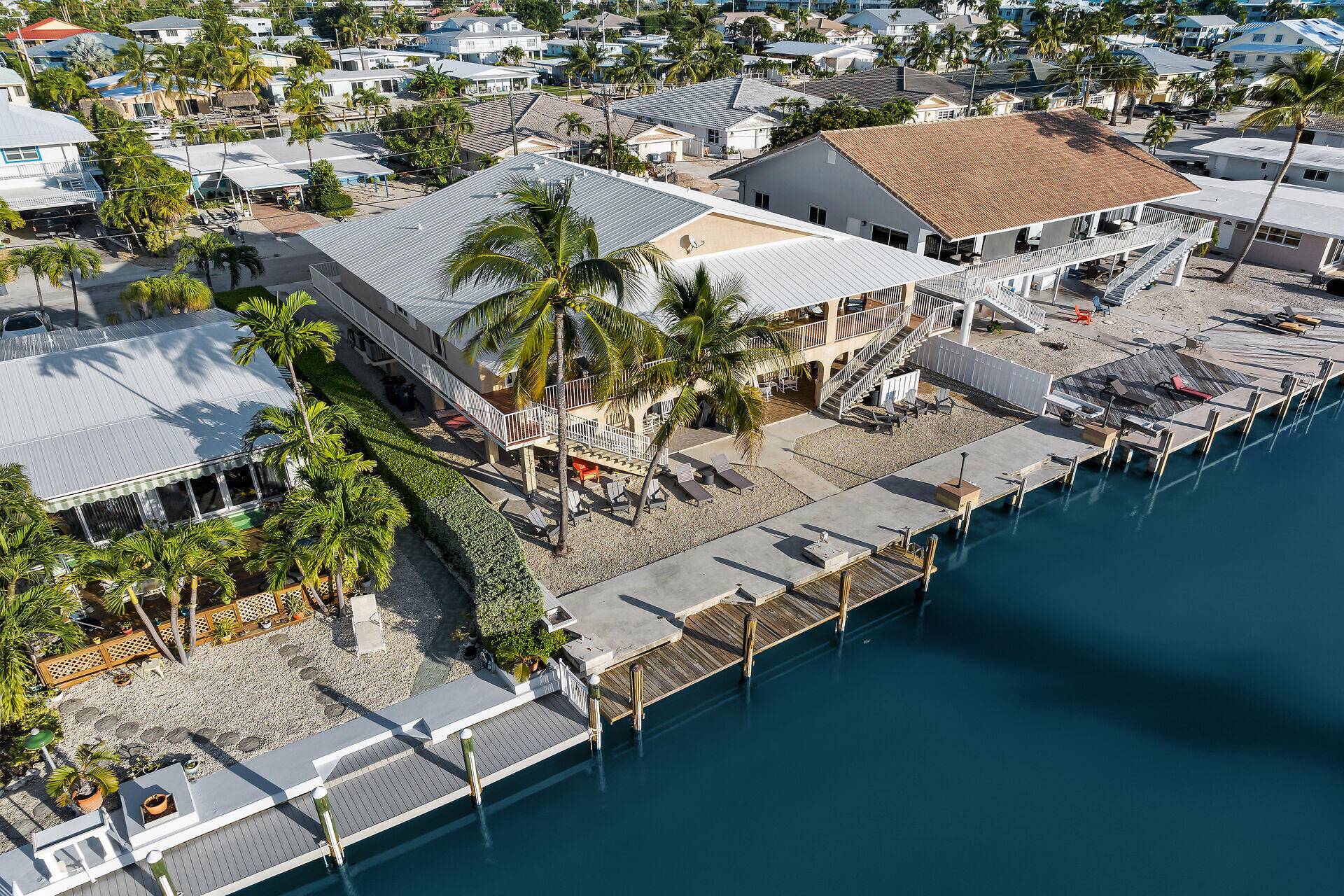 351 10th Street Key Colony Beach, FL 33051 - Photo 32 of 47 an aerial view of residential houses with outdoor space
