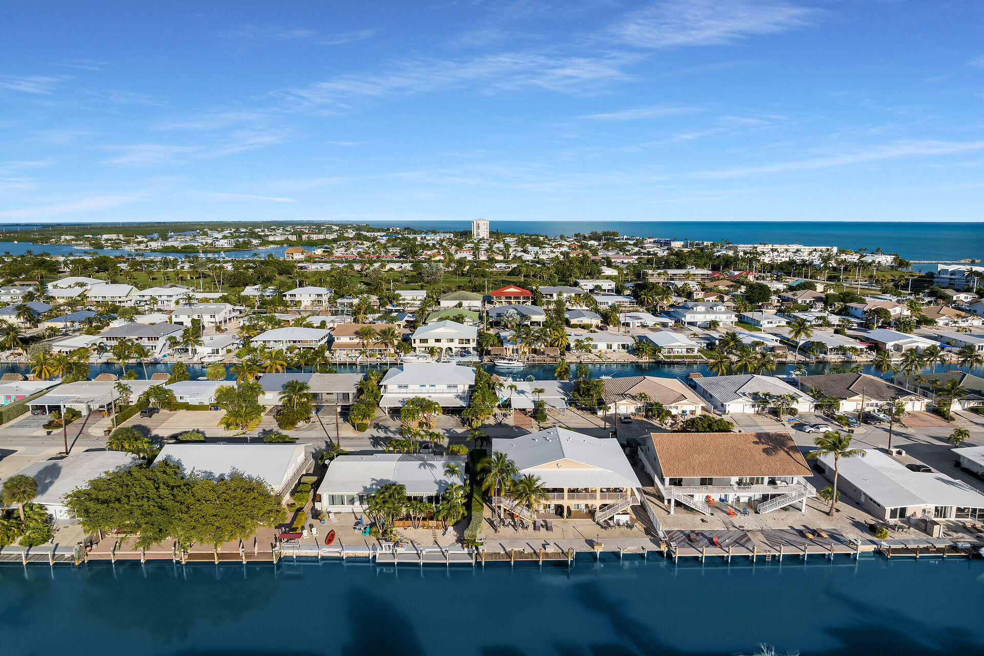 351 10th Street Key Colony Beach, FL 33051 - Photo 34 of 47 an aerial view of residential building with ocean view