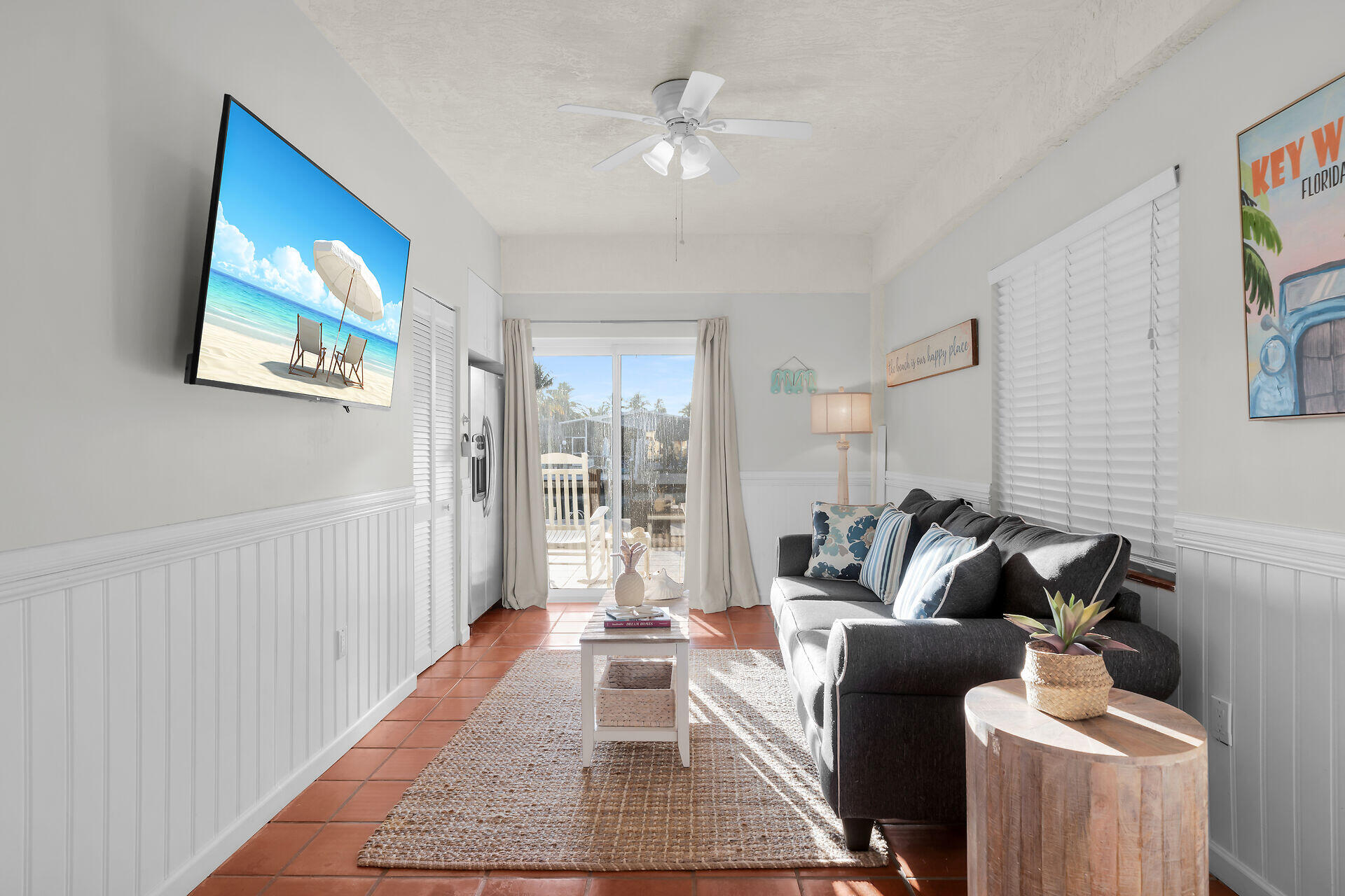 351 10th Street Key Colony Beach, FL 33051 - Photo 37 of 47 a living room with furniture and a rug