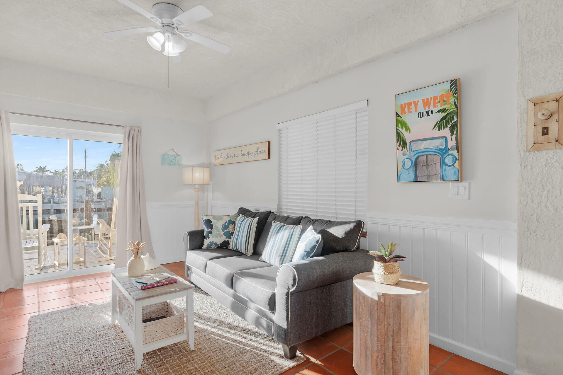 351 10th Street Key Colony Beach, FL 33051 - Photo 38 of 47 a living room with furniture and a large window
