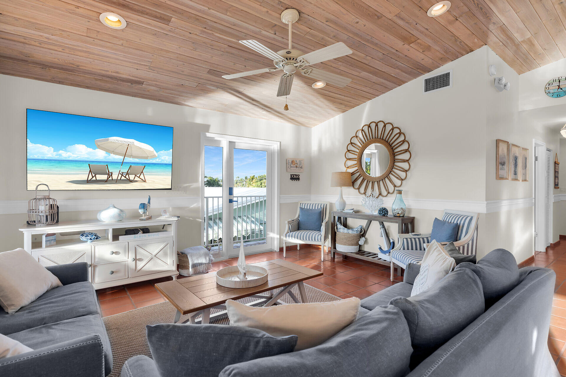 351 10th Street Key Colony Beach, FL 33051 - Photo 4 of 47 a living room with furniture and a large window