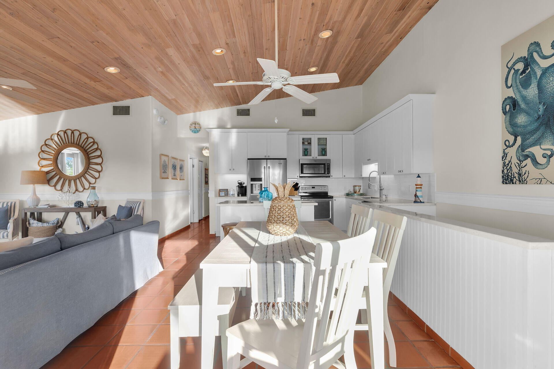 351 10th Street Key Colony Beach, FL 33051 - Photo 6 of 47 a view of a dining room and furniture kitchen and chandelier