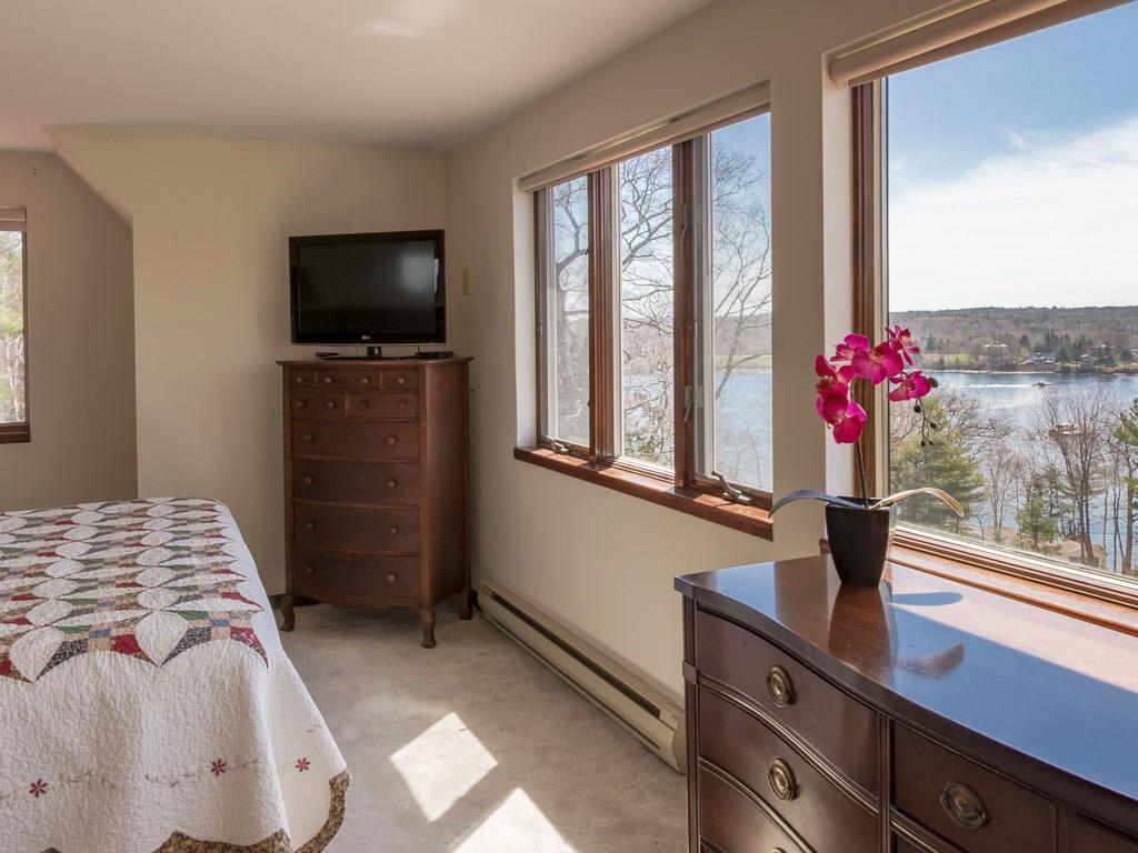 419 Pemaquid Harbor Road Pemaquid, ME 04558 - Photo 20 of 34 Master bedroom with a wall of...