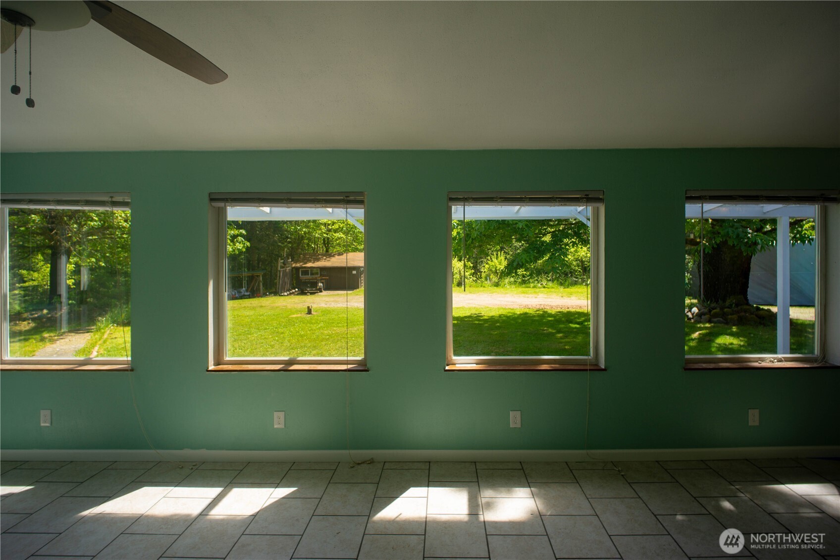 89 Slab Camp Road Sequim, WA 98382 - Photo 15 of 40 a view of front door of house with yard