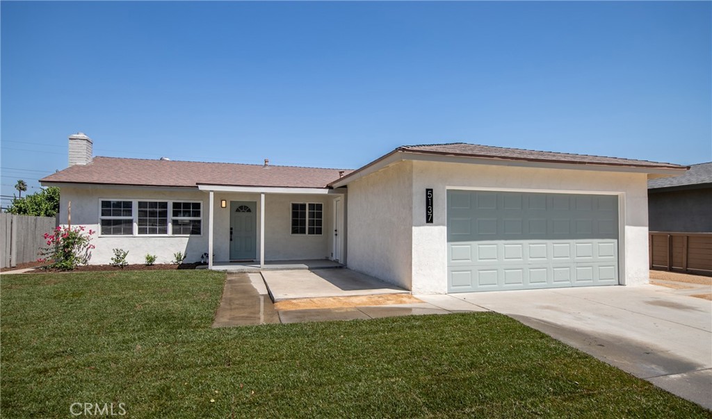 5137 Noble Street Riverside, CA 92503 - Photo 1 of 1 a front view of a house with a yard