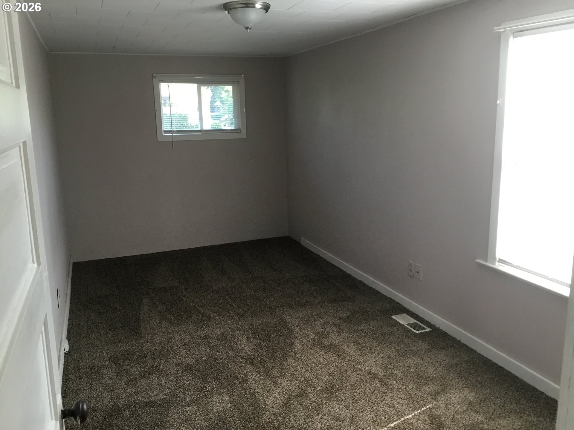 1224 Northeast 60th Avenue Portland, OR 97213 - Photo 4 of 14 an empty room with a window