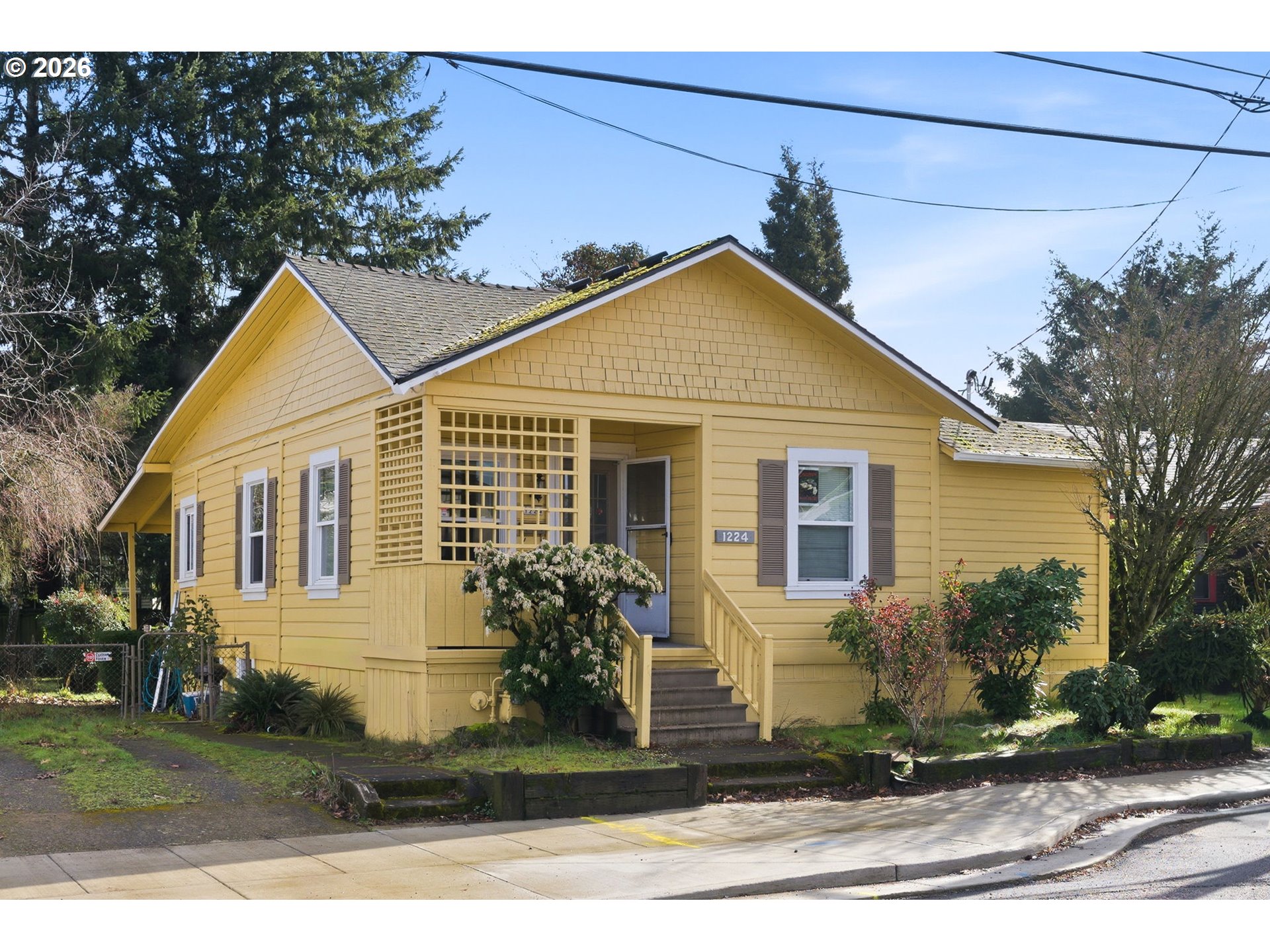 1224 Northeast 60th Avenue Portland, OR 97213 - Photo 9 of 14 a front view of a house with a yard