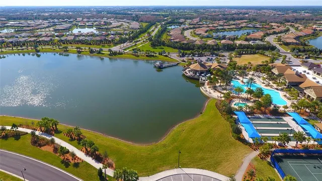 a view of an outdoor space and basketball court