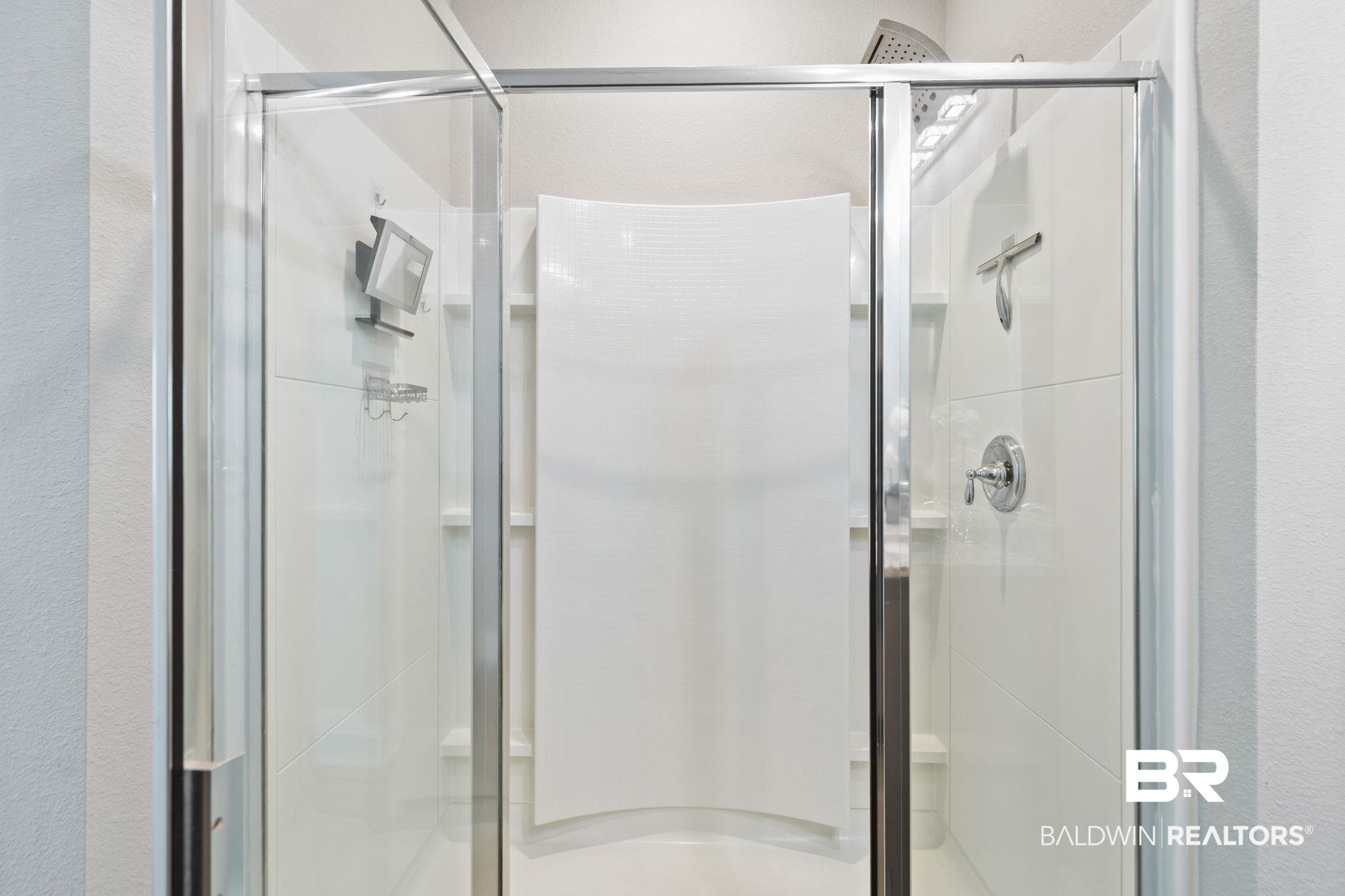 31650 Memphis Loop Daphne, AL 36527 - Photo 29 of 68 Bathroom featuring a shower stall and a textured wall