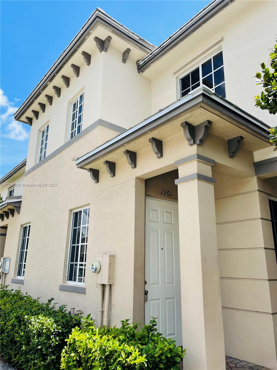 a front view of a house with windows