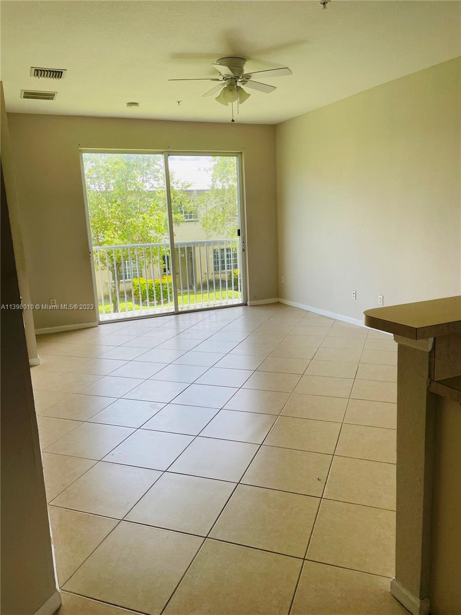 Riviera Beach Riviera Beach, FL 33404 - Photo 7 of 10 a view of an empty room with a window