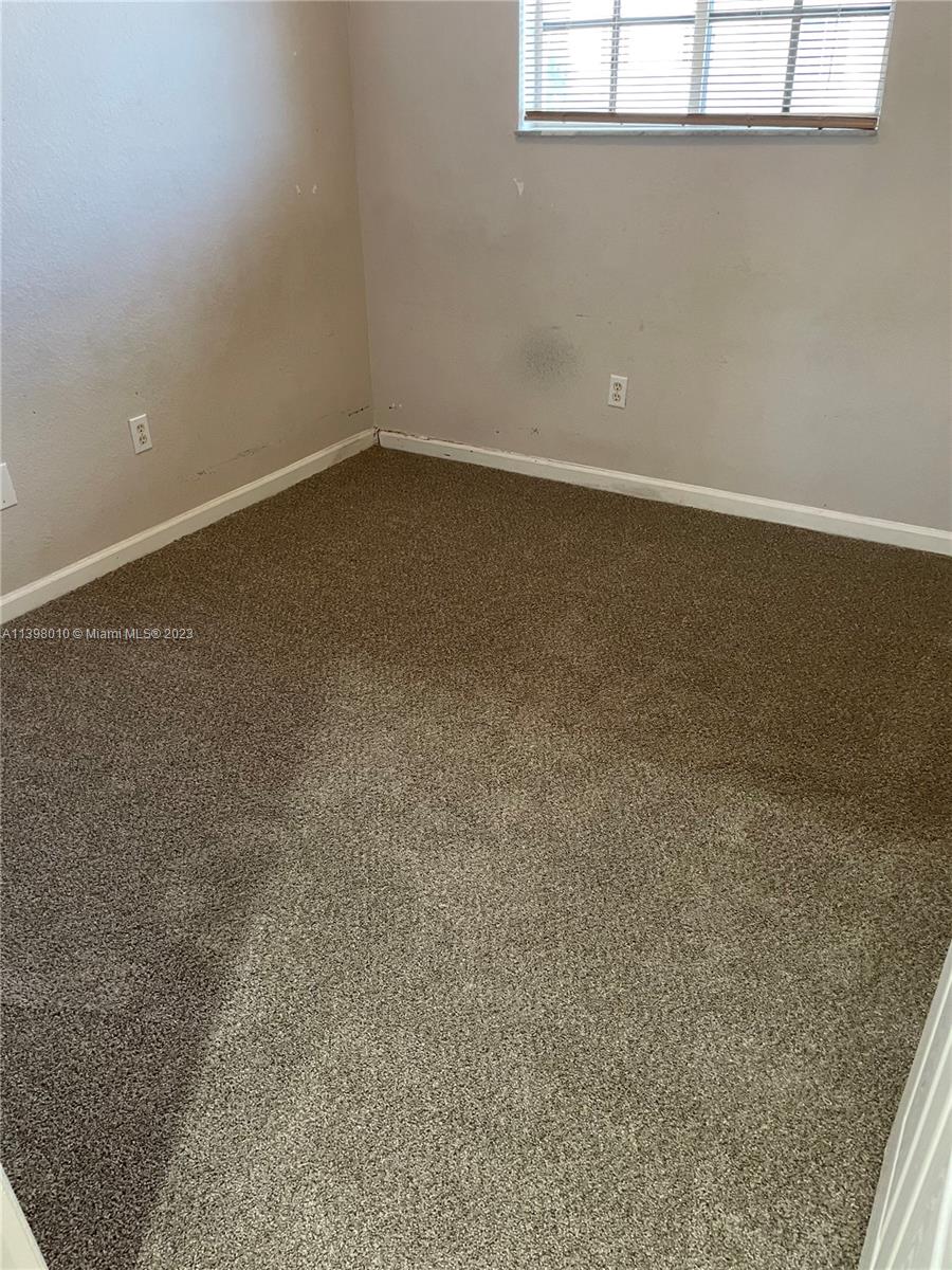 Riviera Beach Riviera Beach, FL 33404 - Photo 8 of 10 a view of a room that has a window in it