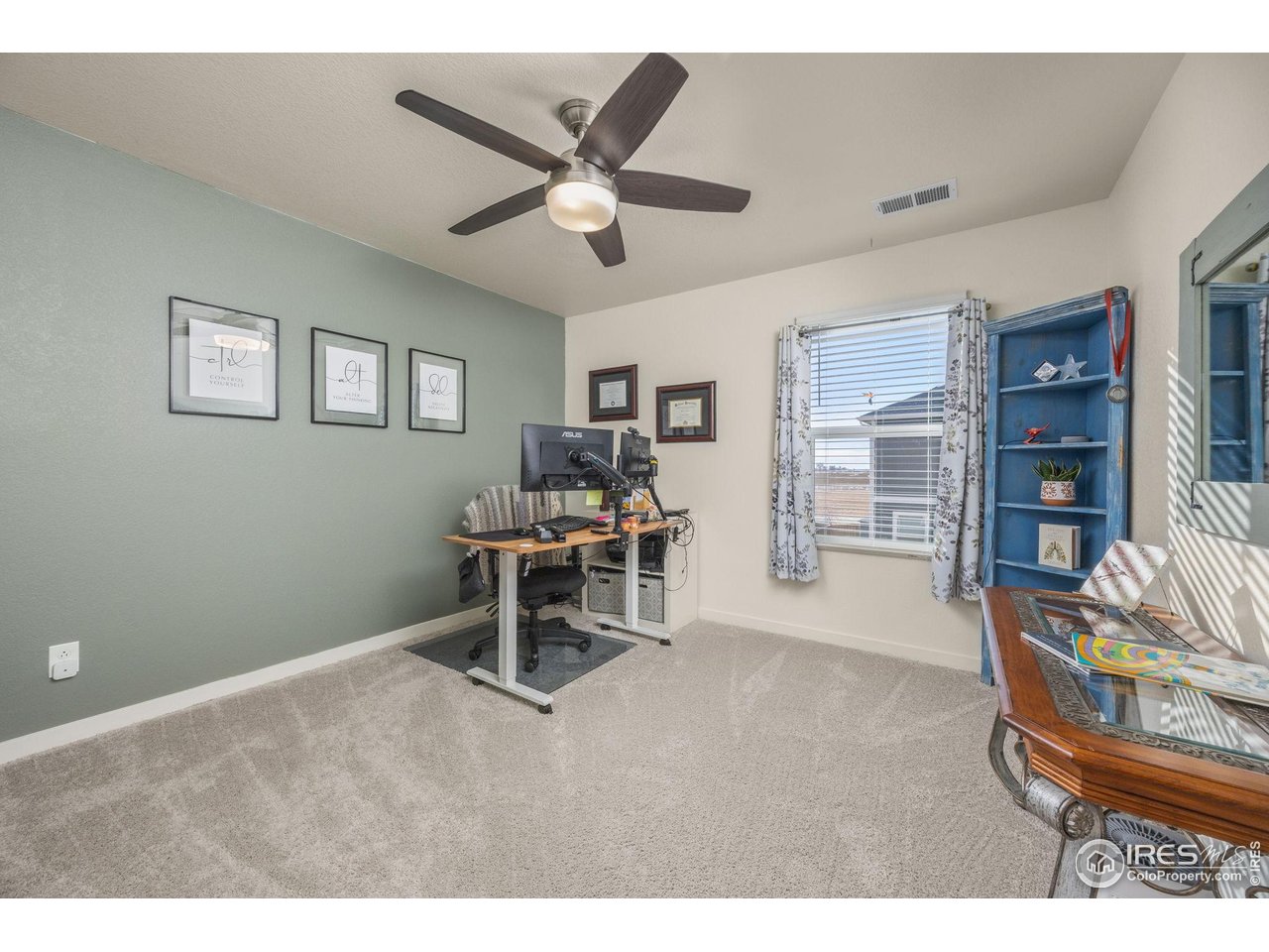 3725 Catmint Street Wellington, CO 80549 - Photo 31 of 44 Dynamic command center optimized for collaborative decision-making and strategic operations. Open layout promotes communication, ergonomic design ensures comfort and productivity. Ideal for managing critical functions.