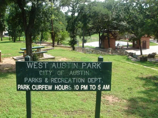 a sign on the side of the park