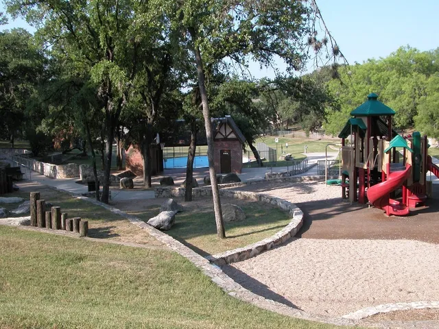 a view of a park with swings