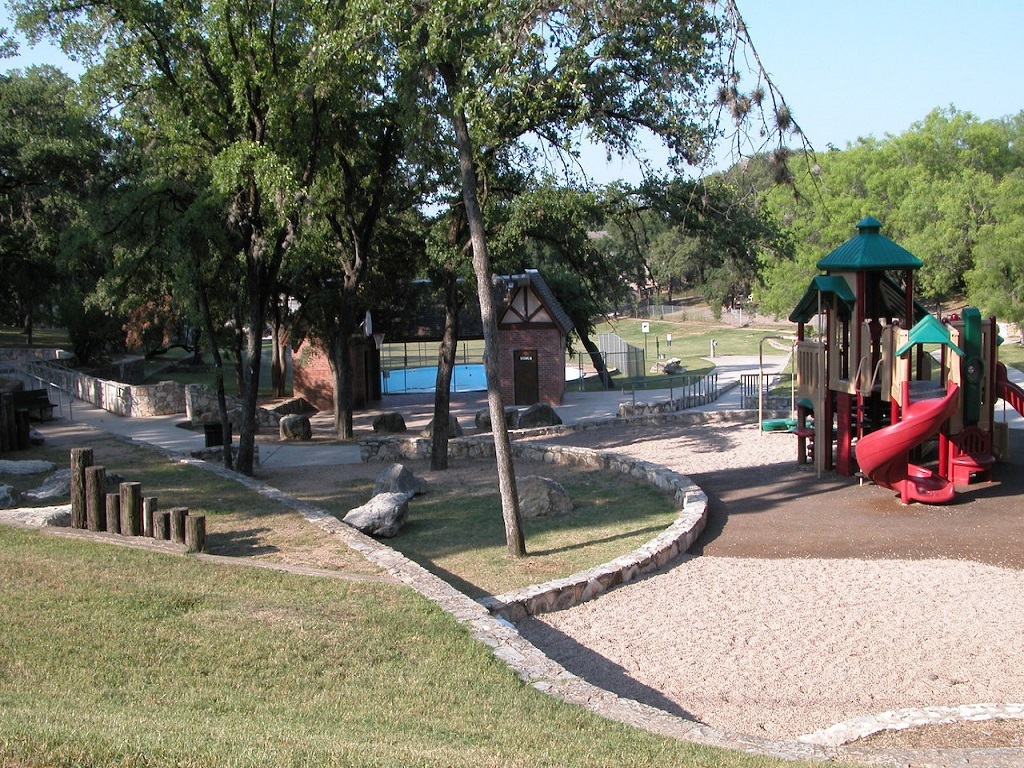 1111 West 10th Street, Unit 111 Austin, TX 78703 - Photo 15 of 25 a view of a park with swings
