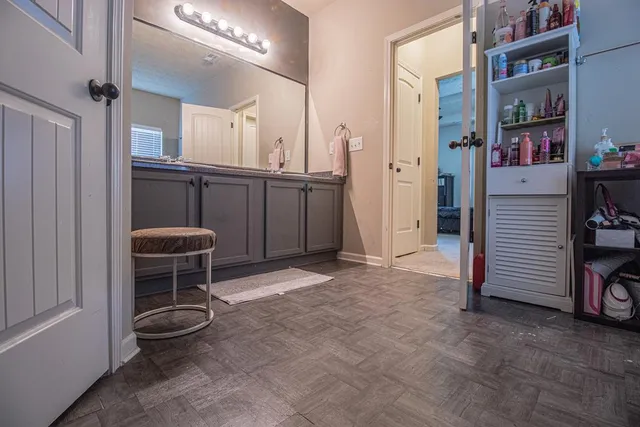 a view of a livingroom with furniture and a window