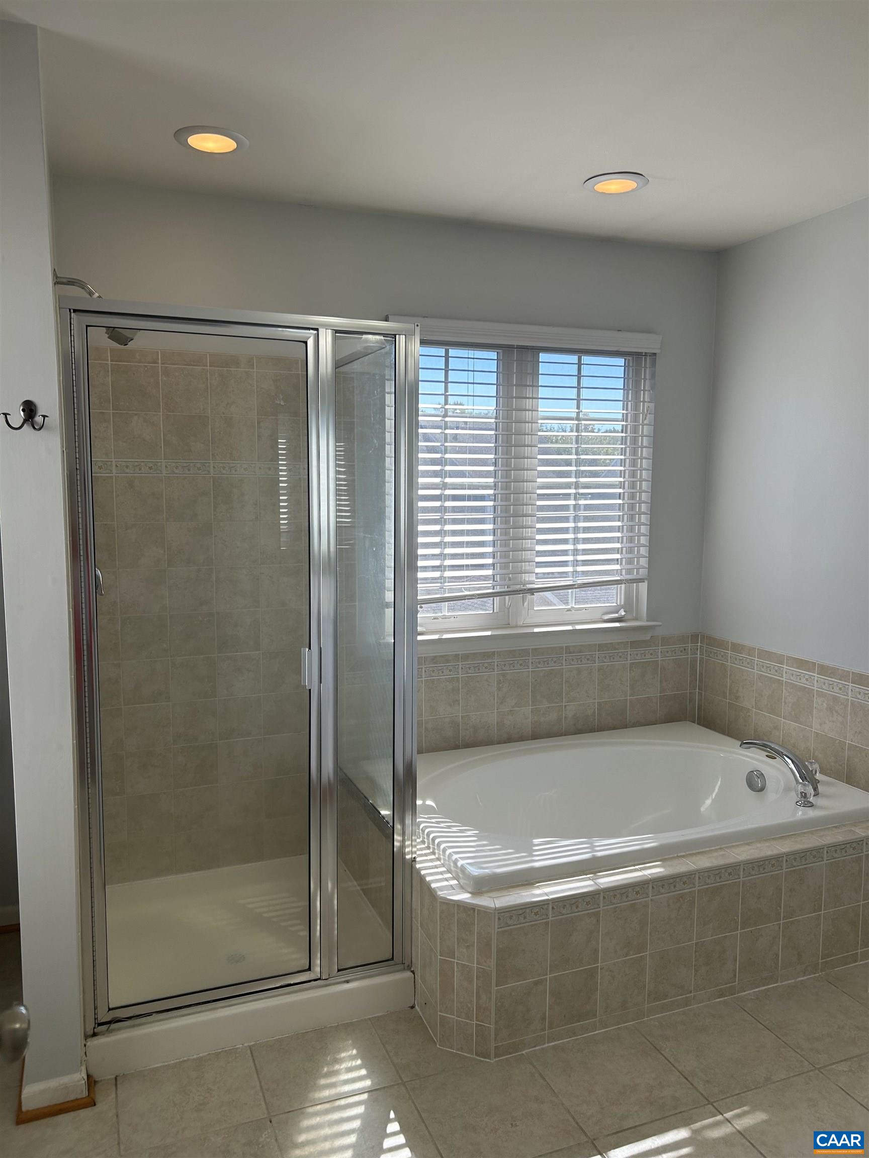 910 Rainier Road Charlottesville, VA 22903 - Photo 21 of 43 a bathroom with a tub and shower