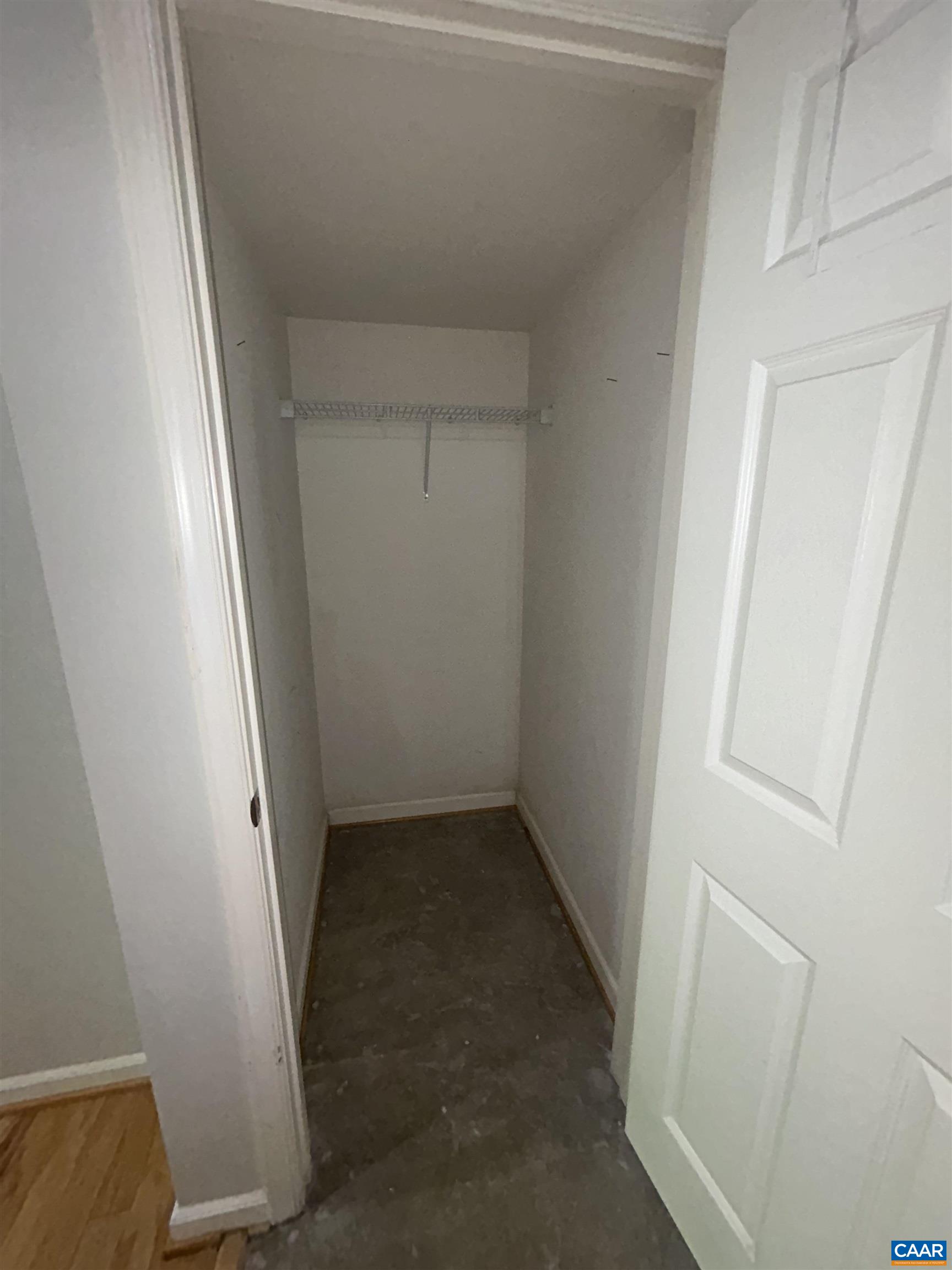 910 Rainier Road Charlottesville, VA 22903 - Photo 26 of 43 an empty room with a wooden door