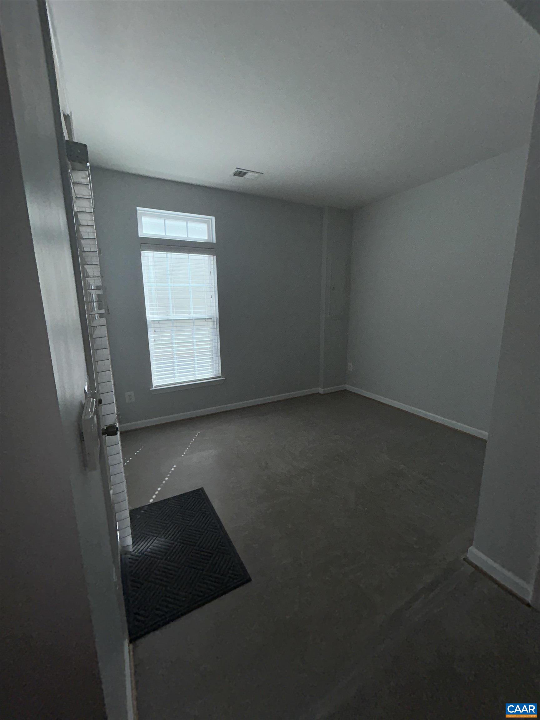 910 Rainier Road Charlottesville, VA 22903 - Photo 28 of 43 an empty room with a window
