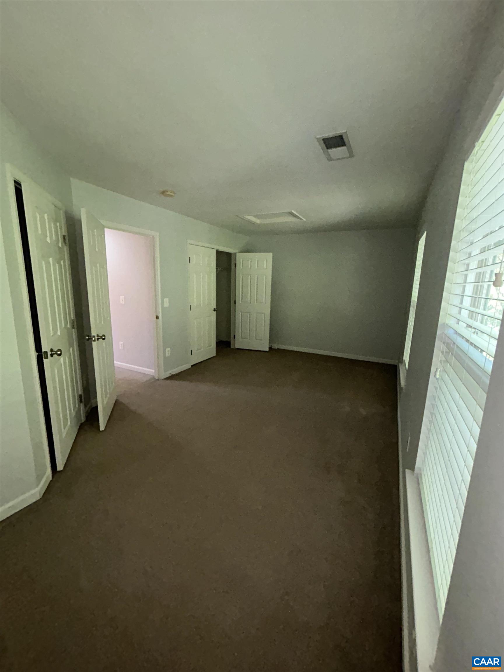910 Rainier Road Charlottesville, VA 22903 - Photo 32 of 43 a view of an empty room with a window