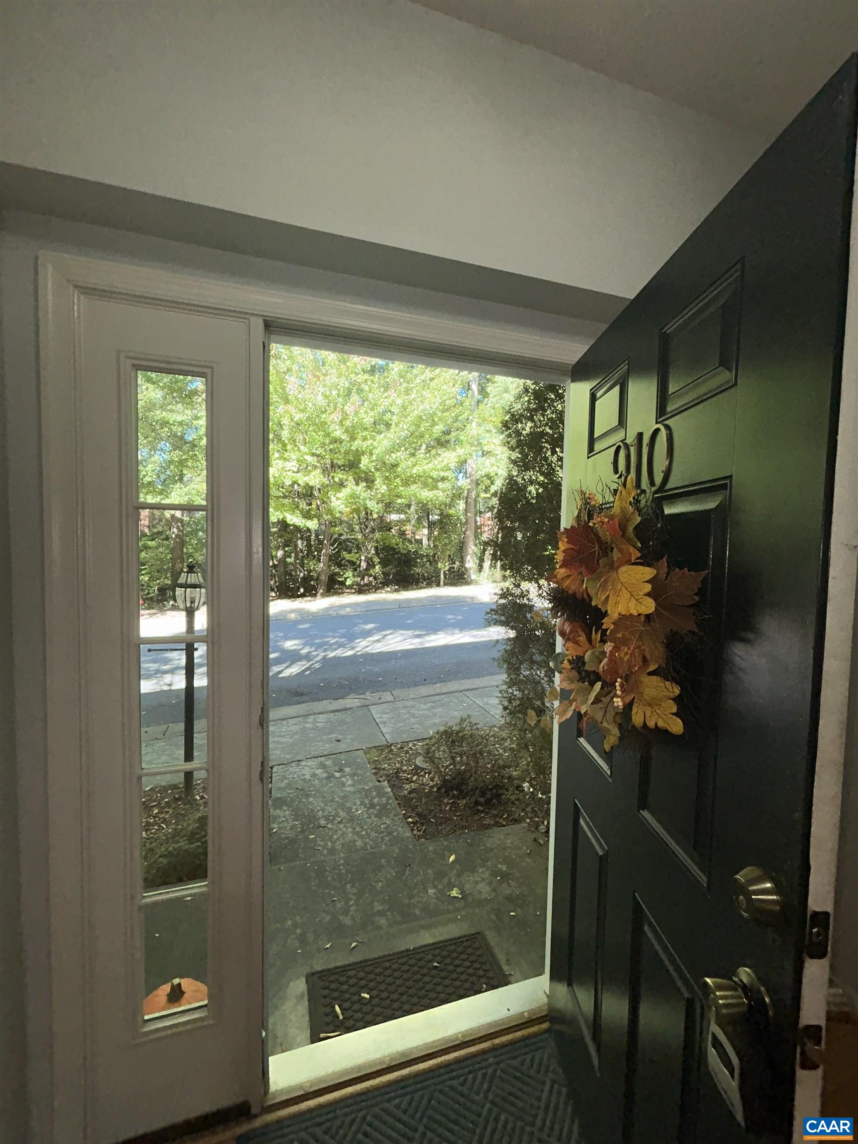 910 Rainier Road Charlottesville, VA 22903 - Photo 4 of 43 a bathroom with a glass shower door